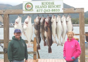 Mike Dunham and Karen King from St. Croix show off their first day's halibut and ling cod catch.